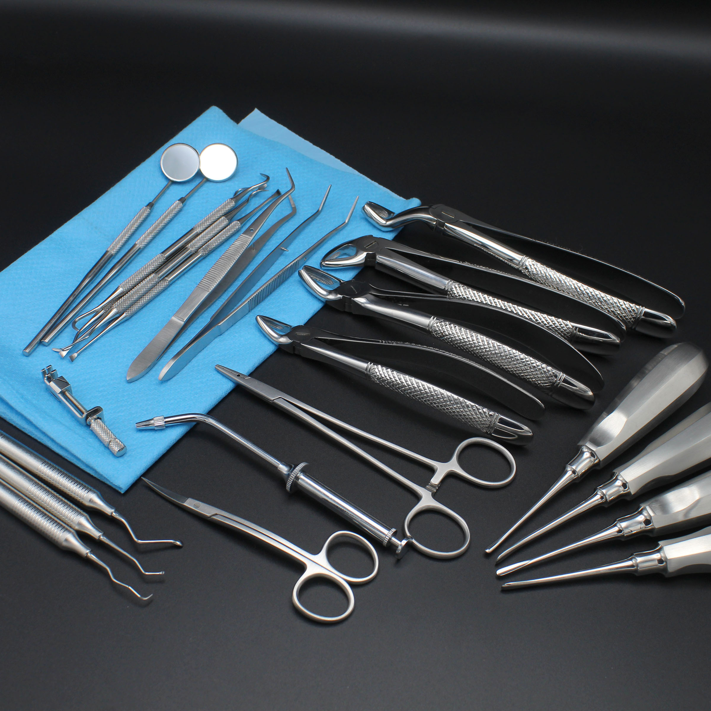 Professional dental instruments on sterile surface